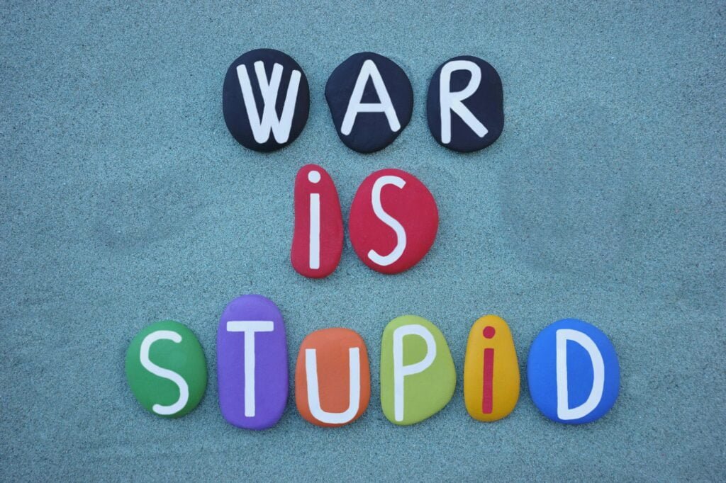 War is stupid, creative slogan composed with multi colored stone letters